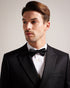 BROSNEY-Ties-The BROSNEY bow tie is the perfect way to add some panache to your look. Made from pure silk, this tie features a ribbed texture for an extra dapper feel. It comes ready-tied for minimal fussing, and has an adjustable neck band for your perfect fit. Bow tie 100% silk Ottoman ribbed texture Pre-tied Adjustable length- Ted Baker Romania